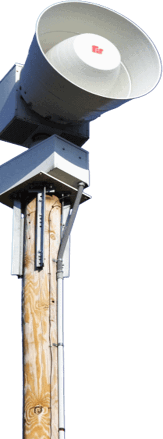 Emergency siren on a wooden pole.