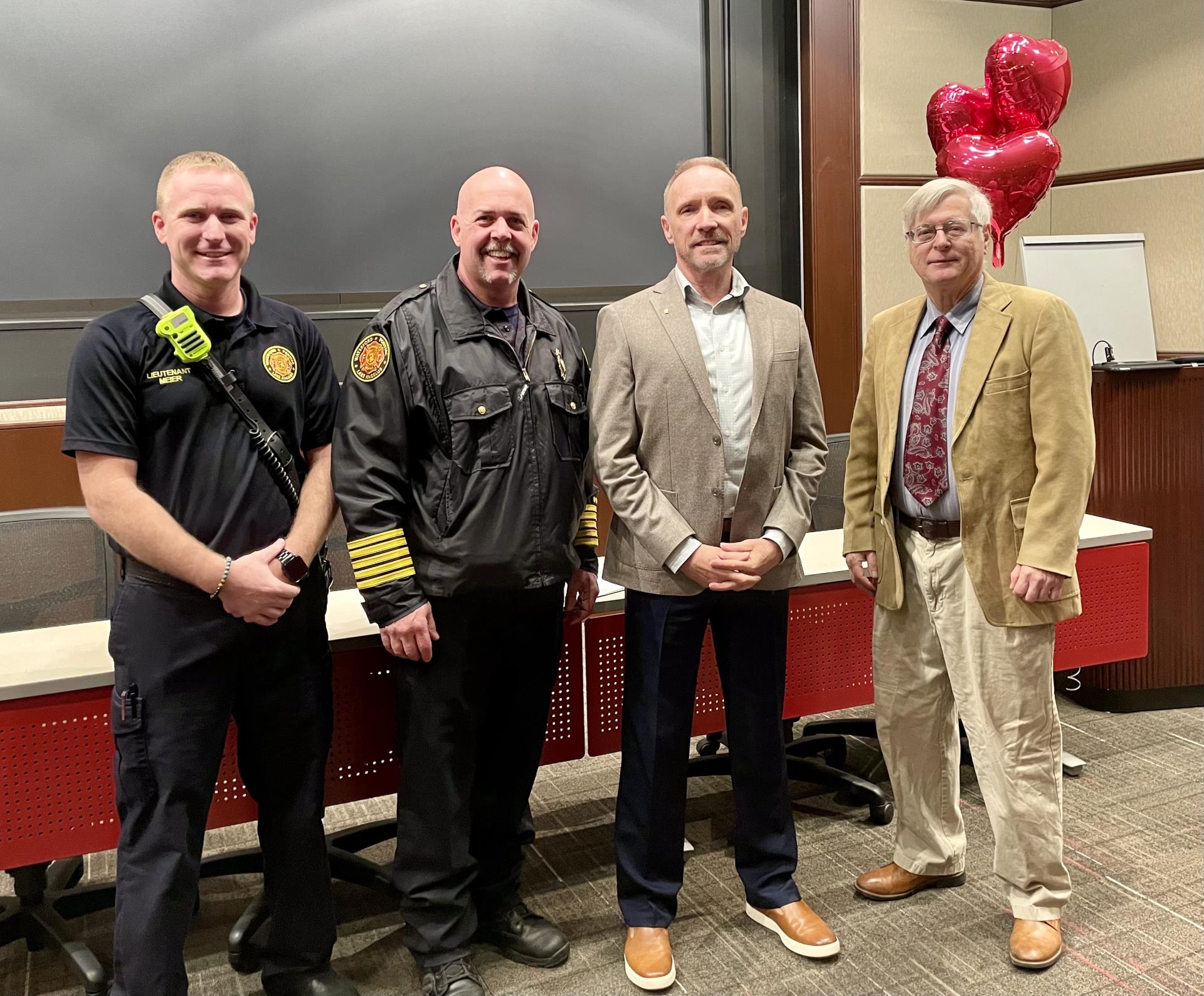 LEFT: Waterford Area Fire Department Lt. Steve Meier, Chief Matt Covey, County Executive Dave Coulter and James Fortune. LEFT: Waterford Area Fire Department Lt. Steve Meier, Chief Matt Covey, County Executive Dave Coulter and James Fortune.