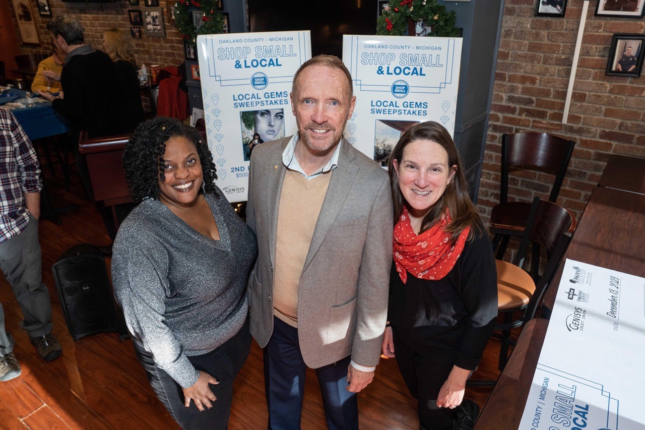 Oakland County Executive Dave Coulter congratulates “Local Gems” Sweepstakes winners