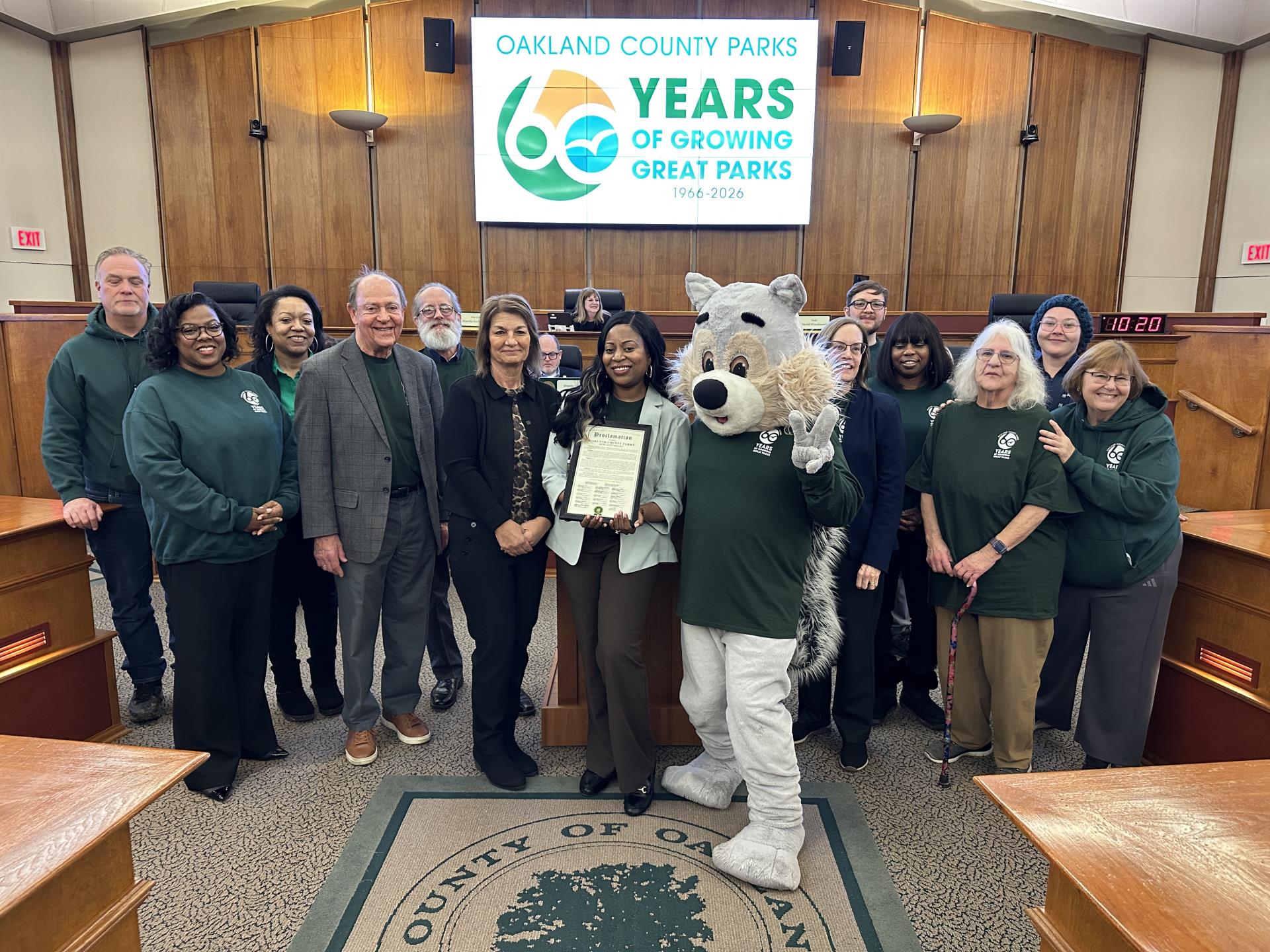 group gathered with Oakie in the OC Commission room