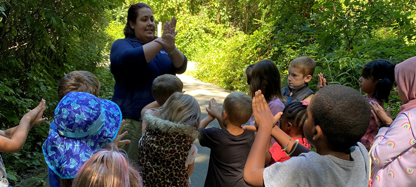 Red Oaks nature center staff leads an interpretive program for school age children